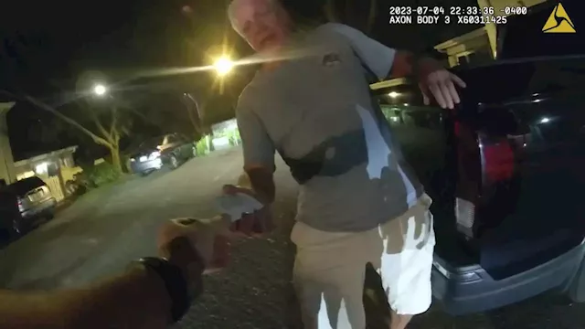 Body cam shows prolific federal drug prosecutor offering cops business card in DUI crash arrest