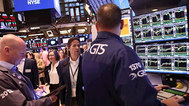 Stock futures are flat in overnight trading with key corporate earnings on deck: Live updates