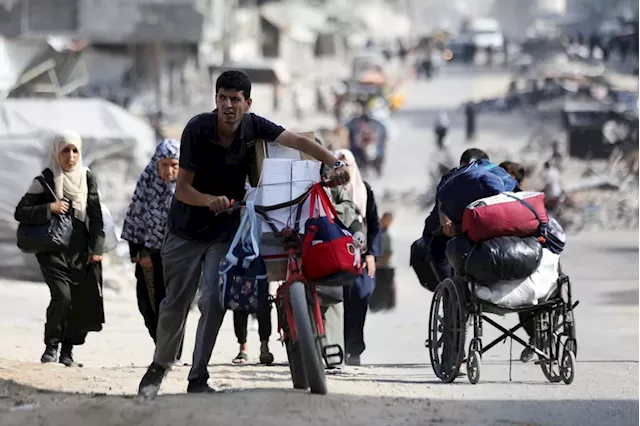 Israeli strikes in Gaza kill family of 8, destroy a century-old market in Lebanon