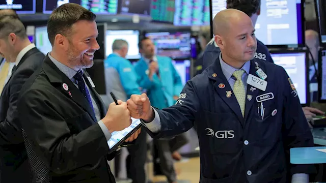 S&P 500 hits record to start the week, traders look to key earnings: Live updates