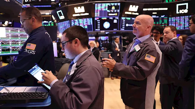 Dow slips from record as earnings season picks up steam: Live updates