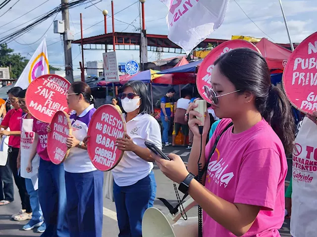 Groups protest public market privatization