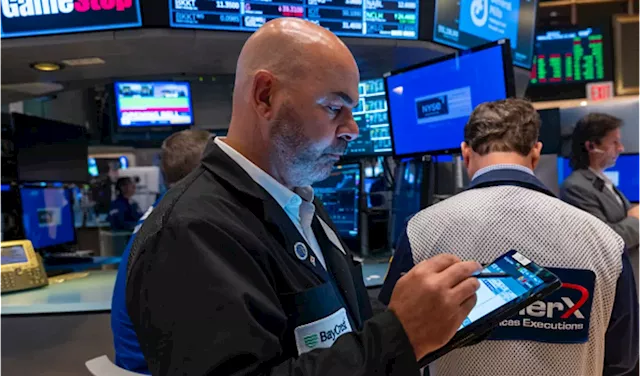 Stocks @ Night: Dow Hits Record High, Cisco Soars, Netflix Earnings Looming