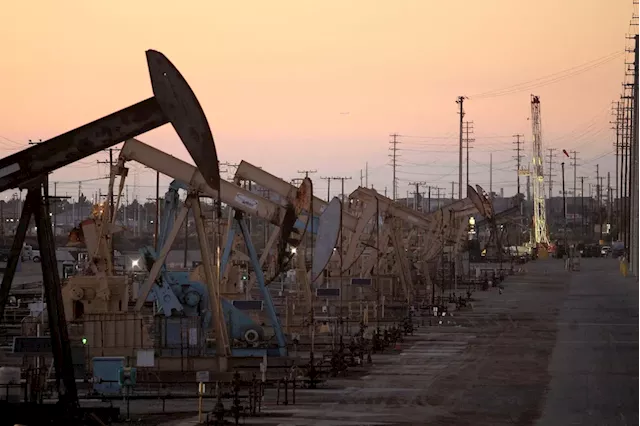 Oil prices slip on higher U.S. crude stocks; market watches Middle East