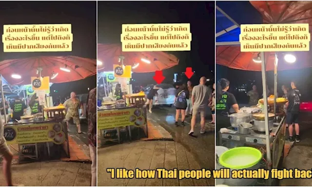 Tourist Gets Doused with Water at Thai Street Market After Lighting Cigarette in No Smoking Area