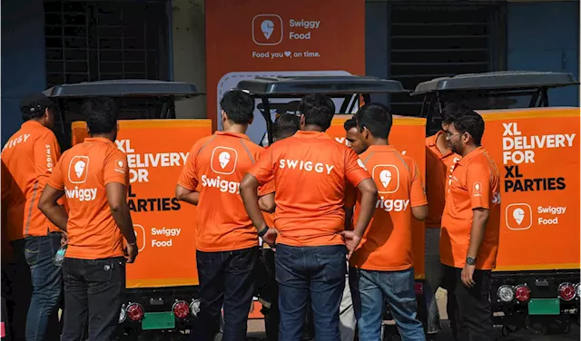 SoftBank-backed Swiggy's shares soar over 13% on India market debut after stellar IPO