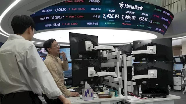 Stock market today: Asian shares meander, tracking Wall Street's mixed finish as dollar surges