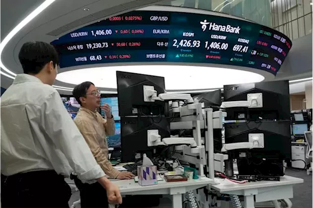 Stock market today: Asian shares meander, tracking Wall Street's mixed finish as dollar surges