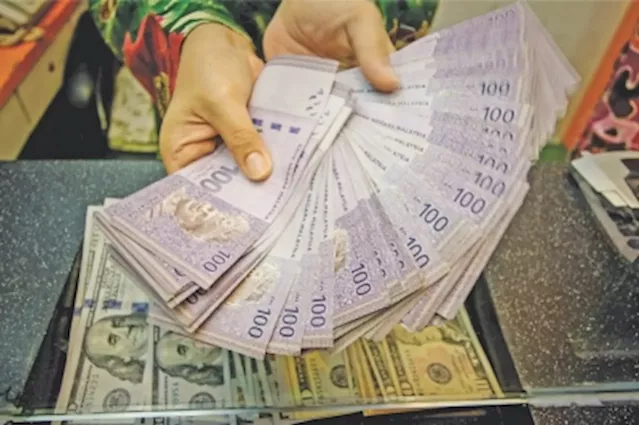 Ringgit, emerging market currencies slip against US dollar amid Fed rate uncertainty