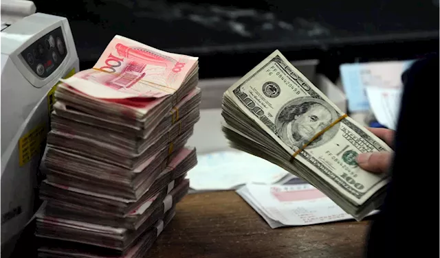 Chinese yuan to hit record lows as U.S. tariff threat mounts, investment banks forecast