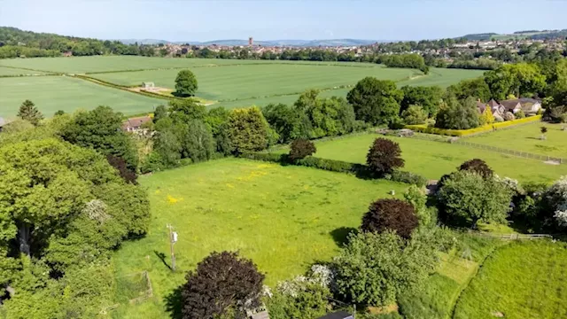 Plot of land in Ludlow with planning permission for home next to river bank hits the market