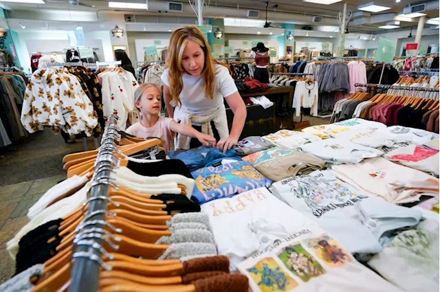 Six-Year-Old Shoppers Support Local Businesses During Small Business Saturday