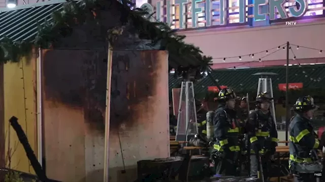 Manhattan holiday market goes up in smoke as flames jump stall to stall, charring items