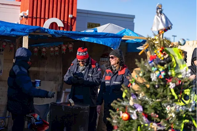 In the news today: Canada Post operations to resume Tuesday: company