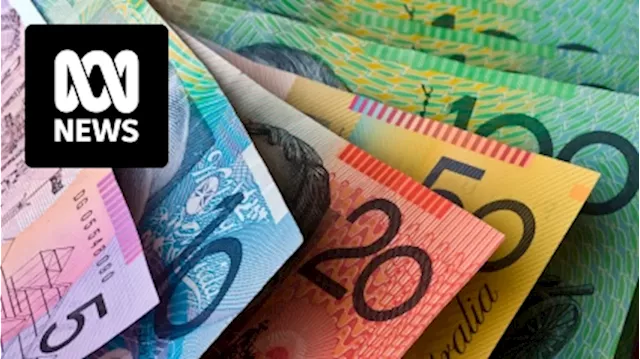 Australian Dollar Sinks as Fed Cuts Rates and Market Tumbles