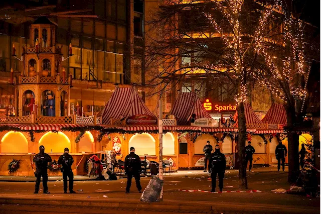 Germans mourn attack on Christmas market with no answers about why