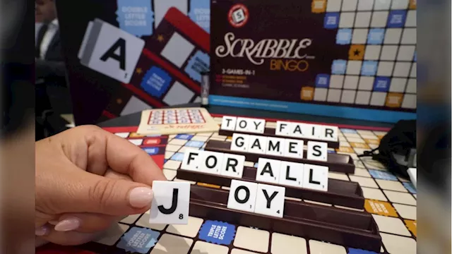 It was Grandma, in the cafe with a Scrabble tile: Game cafes are big holiday business