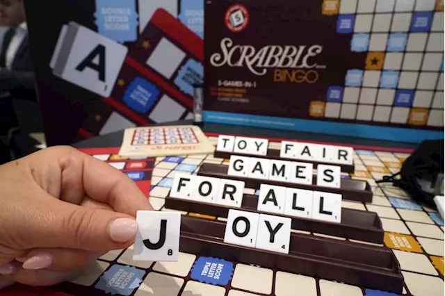 It was Grandma, in the cafe with a Scrabble tile: Game cafes are big holiday business