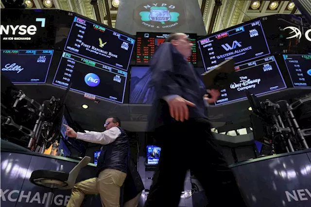 Stocks open mixed amid earnings deluge, revised inflation data