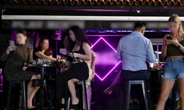 Eastern European women get men to buy special $100 drinks for their company in Boat Quay