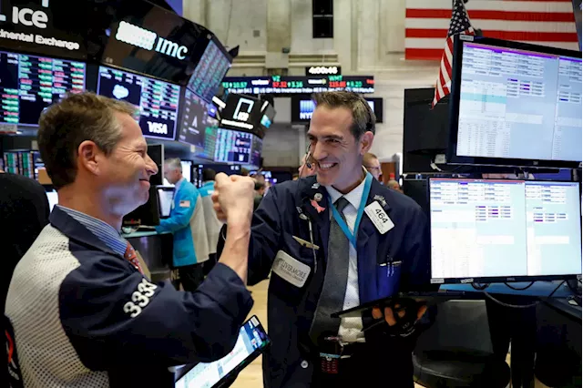 Stock market today: Dow slides, Nasdaq closes at record to cap winning week