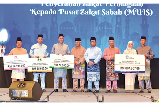 QSB presents RM218,143 in business tithe