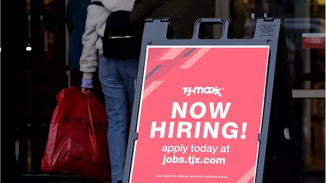 Applications for US unemployment benefits dip to 210,000 in strong job market