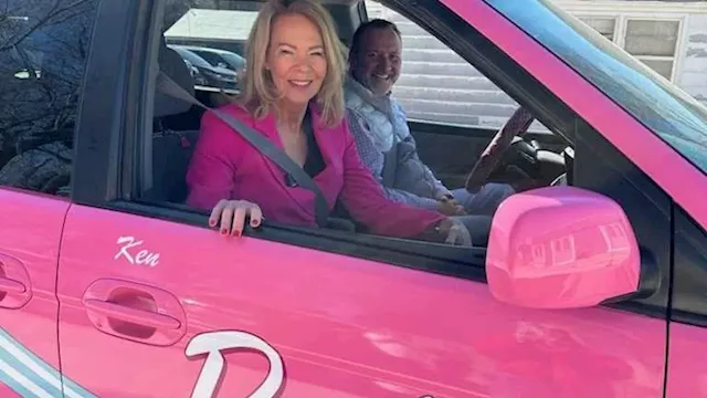 Construction company leaders drive pink Barbie car