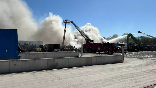 Crews battle large business fire on Indy's west side