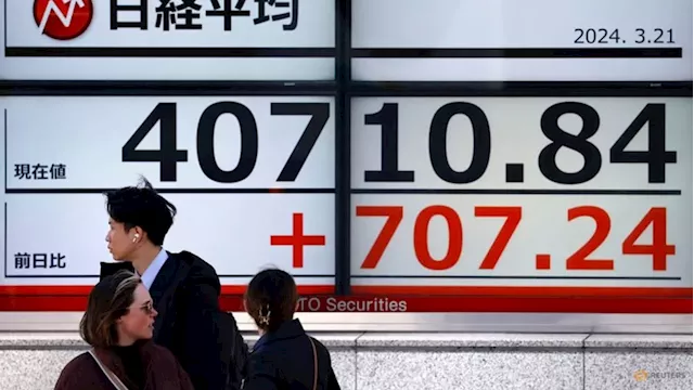 Asia stocks slide, gold rises as Middle East conflict sparks safety rush