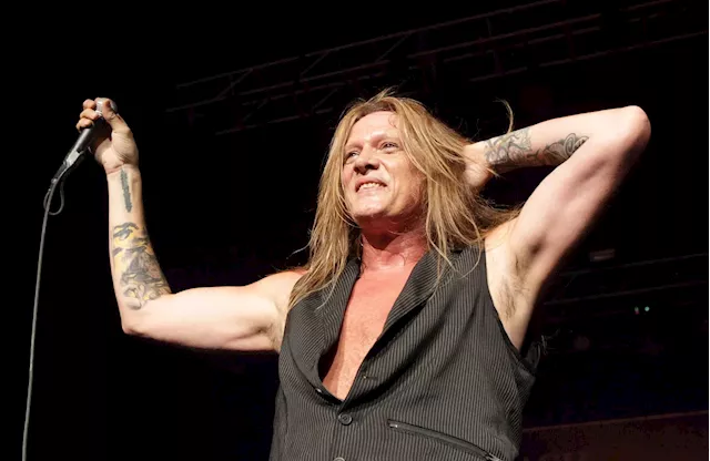 Ex-singer of popular hair metal band says ‘business’ is preventing a reunion