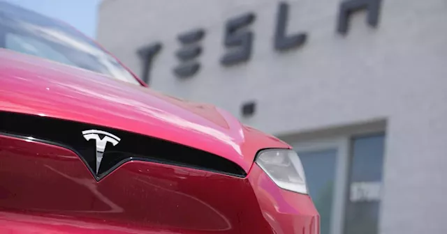 Tesla's stock leaps on reports of Chinese approval for the company's driving software