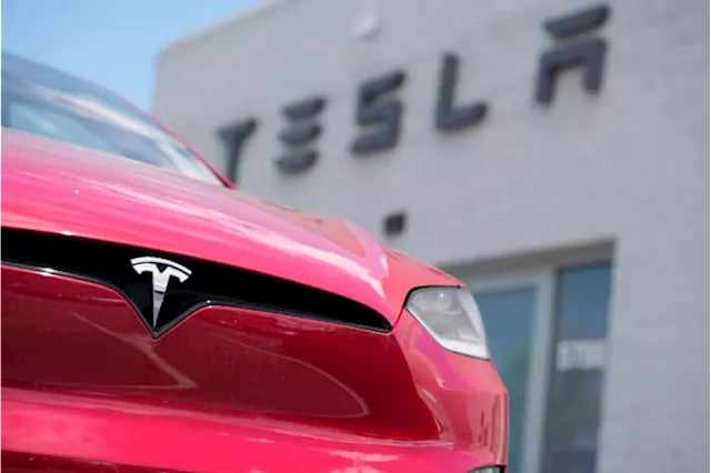 Tesla's stock leaps on reports of Chinese approval for the company's driving software