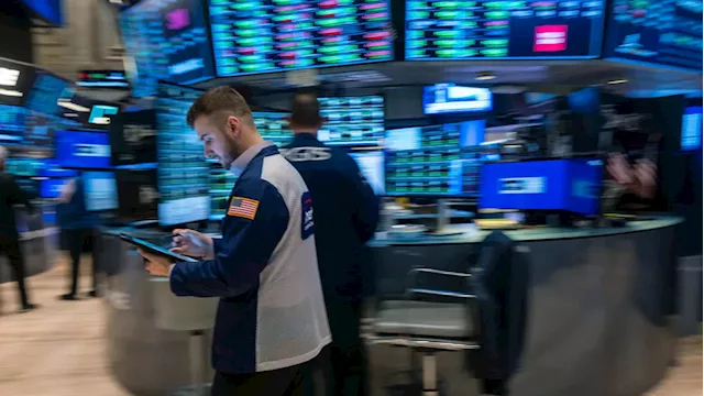 Stocks open higher to kick off a big week for Wall Street