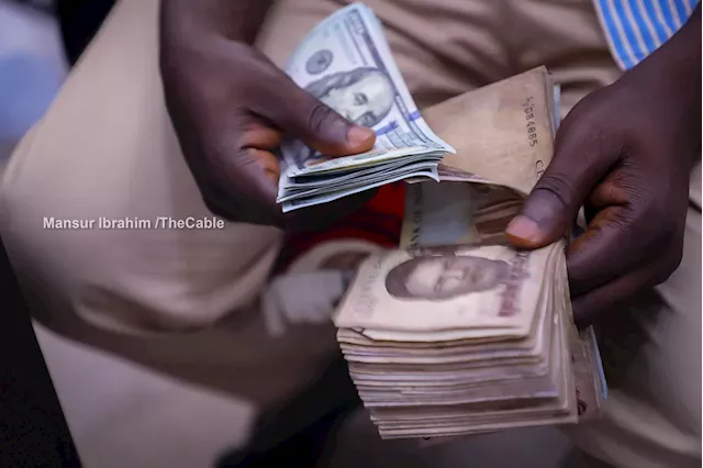 Naira appreciates against dollar at official window, parallel market