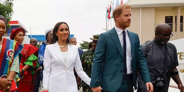 Meghan Markle Nails Business Chic in an All-White Suit on Her Nigerian Tour