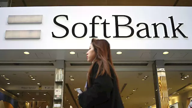 Japan's SoftBank Group trims investment losses but remains in red for fiscal year