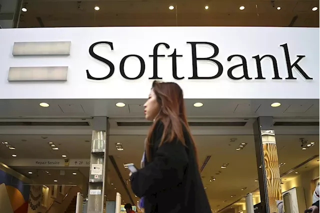 Japan's SoftBank Group trims investment losses but remains in red for fiscal year