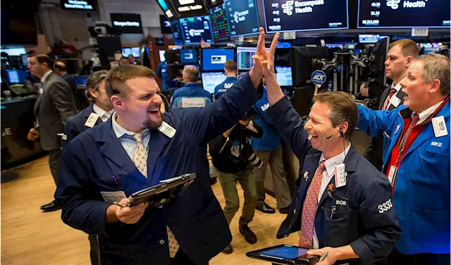 Dow rises above 40,000 for the first time as bull market gains steam: Live updates