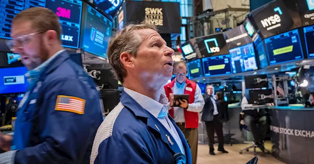 Dow Jones hits record high 40,000 amid promising inflation report and robust corporate earnings