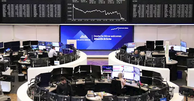 European shares slip at open in earnings tide, Fed outcome