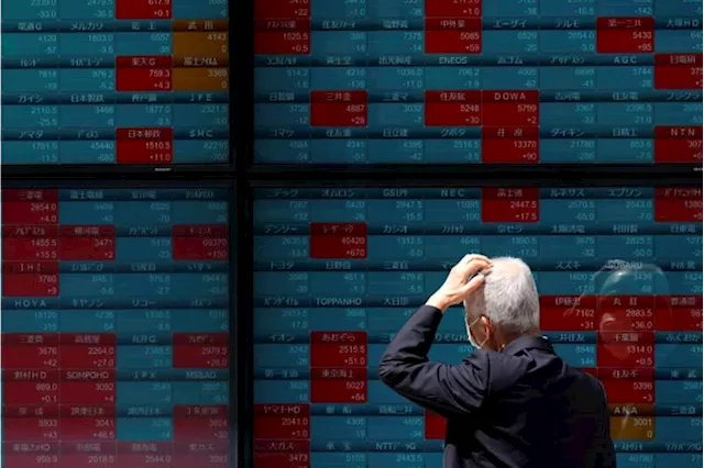 Stock market today: Asian markets wobble after Fed sticks with current interest rates