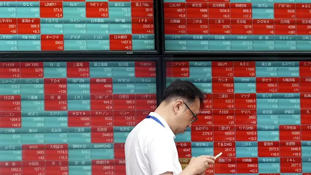 Stock market today: Asian shares decline after a mixed post-holiday session on Wall Street