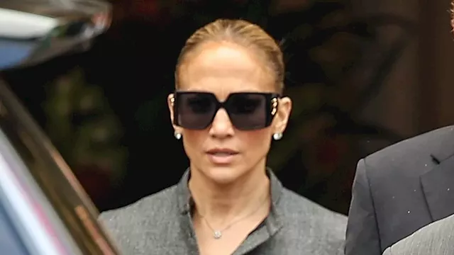 Jennifer Lopez is business chic in a gray dress and chunky shades for lunch in LA