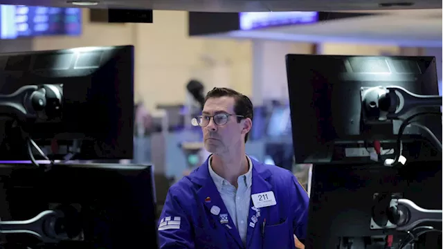 Dow opens lower by over 300 points, stocks eye rate outlook