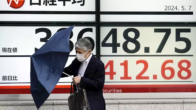 Stock market today: Asian shares mostly higher, though China benchmarks falter