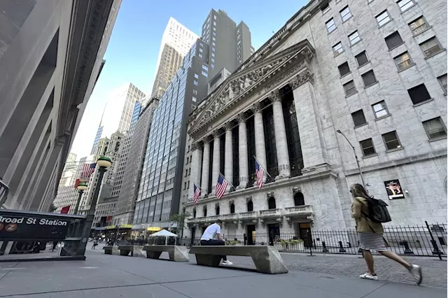 Stock market today: Wall Street drifts to a mixed close but still notches some records