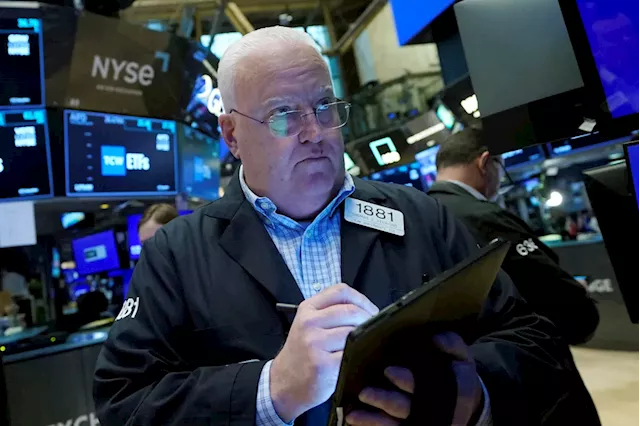 Stock market today: Stocks waver ahead of Fed as Apple surges to record