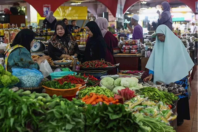 Kelantan market sees rush of customers for last-minute Hari Raya Haji preparations