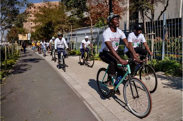 Youth take to their bicycles to protest against mining companies